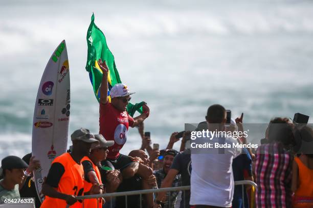 Adriano de Souza of Brazil celebrates his title of the Oi Rio Pro 2017 at Itauna Beach on May 17, 2017 in Saquarema, Brazil.