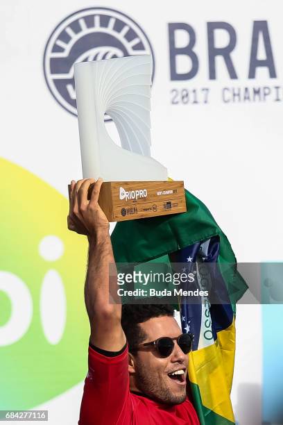 Adriano de Souza of Brazil celebrates his title of the Oi Rio Pro 2017 at Itauna Beach on May 17, 2017 in Saquarema, Brazil.