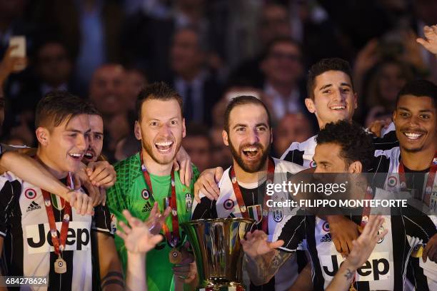 Juventus' forward from Argentina Paulo Dybala, Juventus midfielder Miralem Pjanic, Juventus' goalkeeper from Brazil Neto, Juventus' forward from...