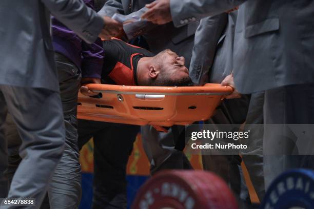 Injured Abdelali Lagsir of Morocco in Men's 105kg Weightlifting final during day six of Baku 2017 - 4th Islamic Solidarity Games at Weightlifting...