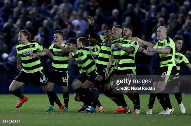 The Huddersfield Town team celebrate after Danny Ward of Huddersfield Town saves the final penatly to send them through to the final after the Sky...