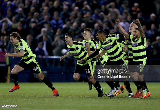 The Huddersfield Town team celebrate after Danny Ward of Huddersfield Town saves the final penatly to send them through to the final after the Sky...