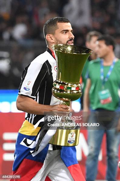 Tomas Ricon Juventus midfielder from Venezuela Tomas Rincon holds the trophy ...