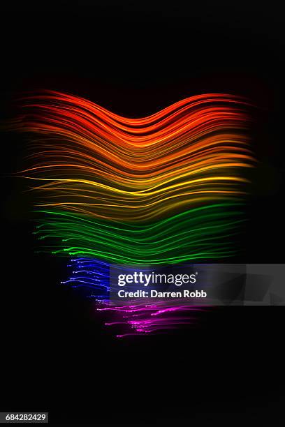 gay flag rainbow of fibre optic trails - rainbow colours stock pictures, royalty-free photos & images