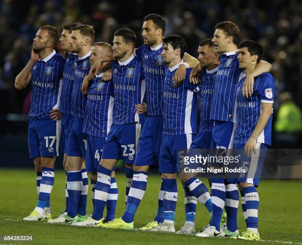 The Sheffield Wednesday team look on during the penalty shoot out during the Sky Bet Championship play off semi final, second leg match between...