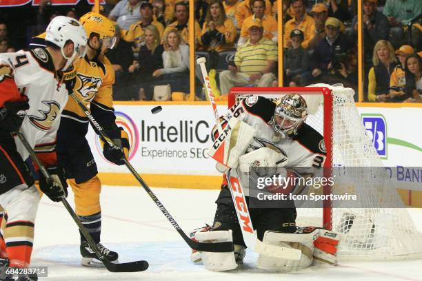 Nashville Predators left wing Colin Wilson looks for a rebound in front of Anaheim Ducks goalie John Gibson during Game Three of Round Three of the...