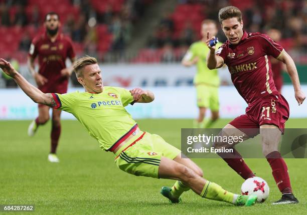 Rubon Rochina of FC Rubin Kazan vies for the ball with Pontus Wernbloom FC CSKA during the Russian Premier League match between FC Rubin Kazan and FC...