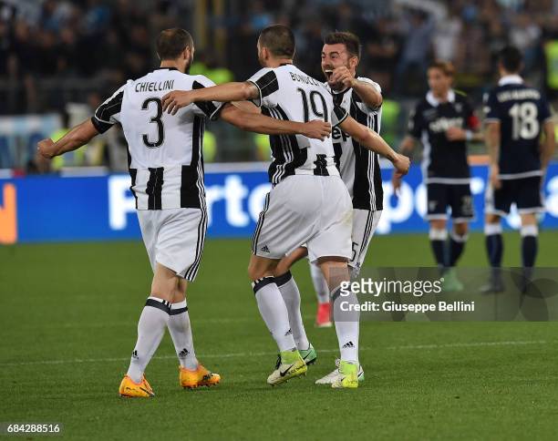Giorgio Chiellini, Leonardo Bonucci and Andrea Barzagli of Juventus FC celebrate the victory after the TIM Cup Final match between SS Lazio and...