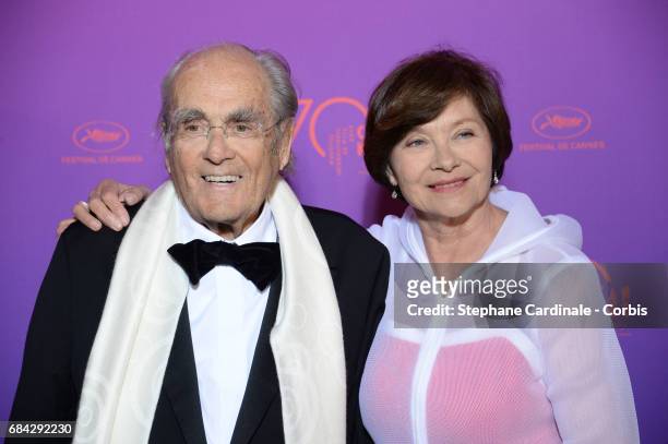 Actress Macha Meril and music composer Michel Legrand attend the Opening Gala Dinner during the 70th annual Cannes Film Festival at Palais des...