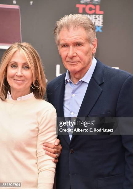 Chairman and CEO of 20th Century Fox Stacey Snider and actor Harrison Ford attend Sir Ridley Scott's hand and footprint ceremony at TCL Chinese...