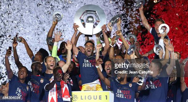 Captain of AS Monaco Radamel Falcao holding the trophy and teammates during the French League 1 Championship title celebration following the French...