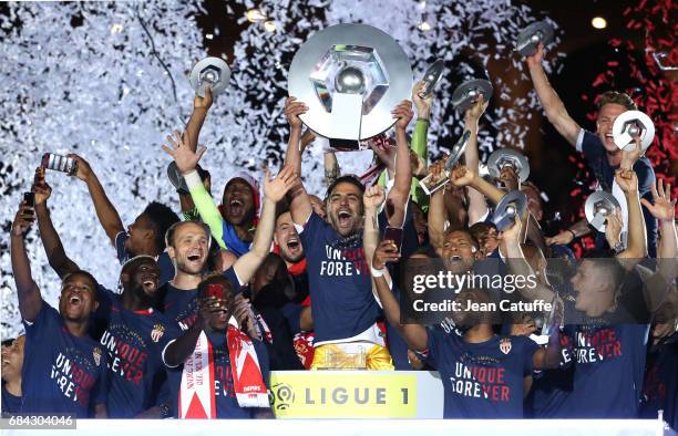 Captain of AS Monaco Radamel Falcao holding the trophy and teammates during the French League 1 Championship title celebration following the French...