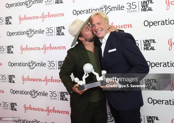 Brian Bowen Smith and Robert Duffy attend the 35th anniversary of Operation Smile at West Edge on May 17, 2017 in New York City.