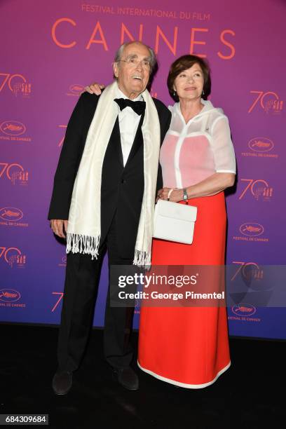 Actress Macha Meril and music composer Michel Legrand attends the Opening Gala dinner during the 70th annual Cannes Film Festival at Palais des...