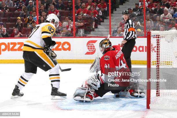 Sidney Crosby of the Pittsburgh Penguins scores a goal against Craig Anderson of the Ottawa Senators during the third period in Game Three of the...