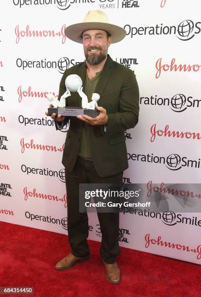Event honoree, photographer Brian Bowen Smith attends the 35th Anniversary of Operation Smile at West Edge on May 17, 2017 in New York City.