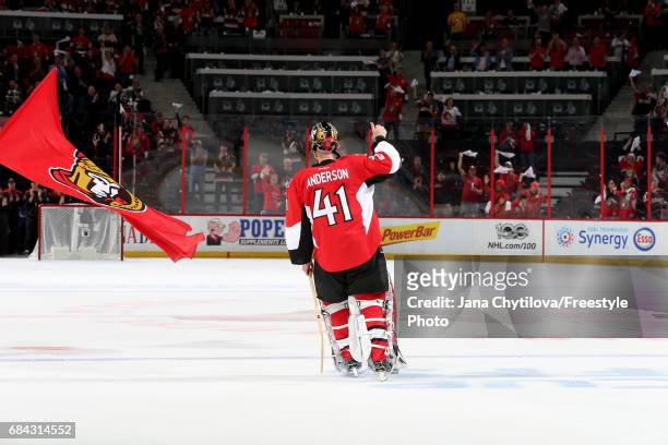 Craig Anderson of the Ottawa Senators celebrates after defeating the Pittsburgh Penguins with a score of 5 to 1 in Game Three of the Eastern...