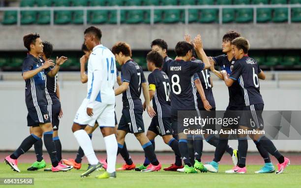 Koki Ogawa of Japan celebrates scoring the opening goal with his team mates during the U-20 international friendly match between Japan and Honduras...