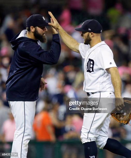 Starting pitcher Michael Fulmer of the Detroit Tigers celebrates with Tyler Collins of the Detroit Tigers after a 5-4 win over the Baltimore Orioles...