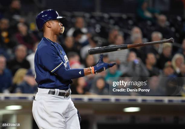 Keon Broxton of the Milwaukee Brewers tosses hit bat after striking out during the fifth inning of a baseball game against the San Diego Padres at...