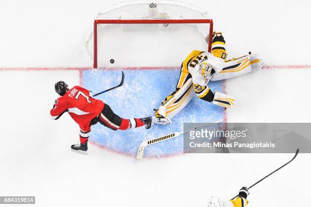 Kyle Turris of the Ottawa Senators scores on goaltender Matt Murray of the Pittsburgh Penguins during the second period in Game Three of the Eastern...