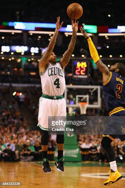 Isaiah Thomas of the Boston Celtics shoots the ball against Kyrie Irving of the Cleveland Cavaliers in the second half during Game One of the 2017...