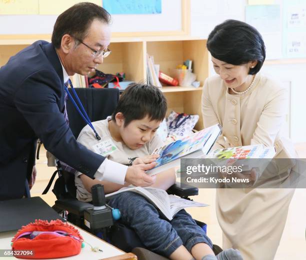 Princess Kiko visits a medical facility for children in the northeastern Japan city of Sapporo on May 18 in her first public appearance since it was...