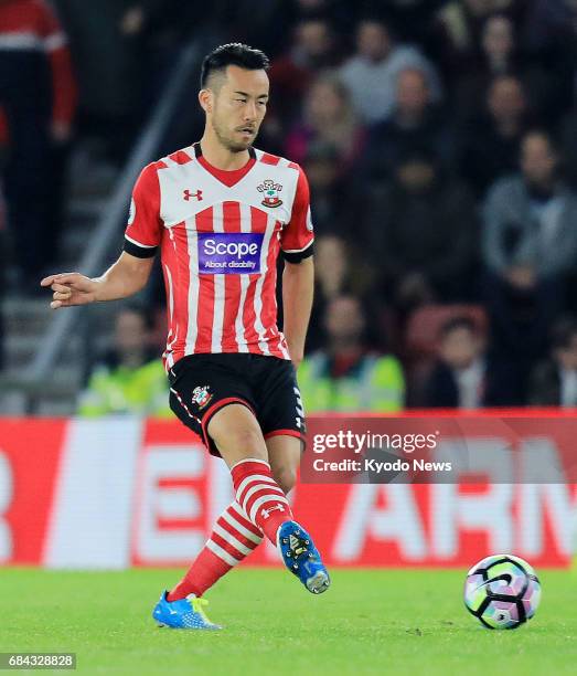 Southampton defender Maya Yoshida makes a pass during the second half of an English Premier League game at home against Manchester United on May 17,...