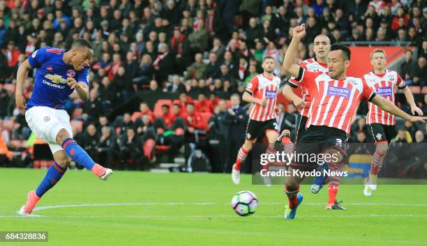 Southampton defender Maya Yoshida blocks a shoot during the first half of an English Premier League game at home against Manchester United on May 17,...