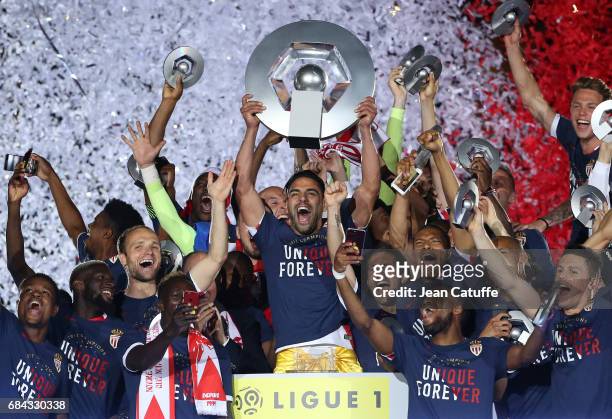 Captain of AS Monaco Radamel Falcao holding the trophy and teammates during the French League 1 Championship title celebration following the French...
