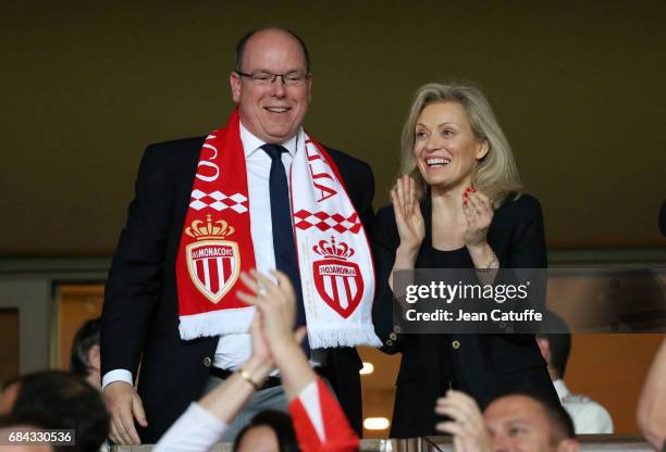 Prince Albert II of Monaco celebrates with President of French League Nathalie Boy de la Tour winning the French Ligue 1 Championship title following...