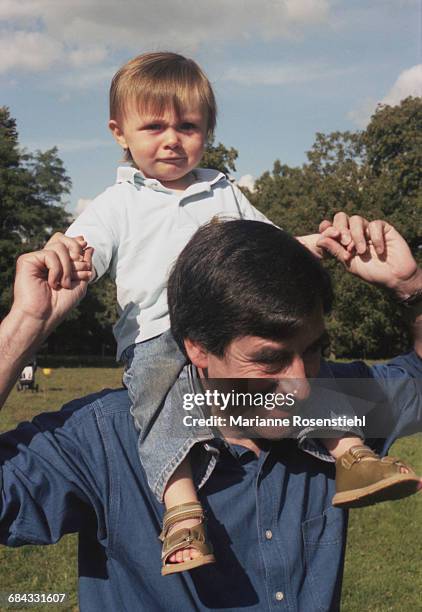 French politician François Fillon with his son Arnaud, 1st September 2002. Fillon is Minister of Social Affairs, Labour and Solidarity in the...