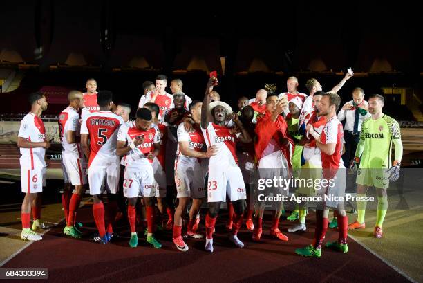 Benjamin Mendy and players of Monaco celebrate winning the Ligue 1 title after the Ligue 1 match between As Monaco and AS Saint Etienne at Stade...