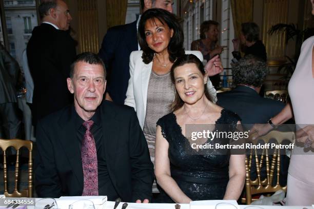 Nicole Guedj standing between Ambassador of Israel to France, Aliza Bin-Noun and her husband attend the "Vaincre Le Cancer" Gala - 30th Anniverary at...
