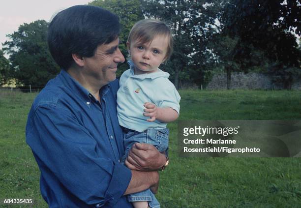 French politician François Fillon with his son Arnaud, 1st September 2002. Fillon is Minister of Social Affairs, Labour and Solidarity in the...