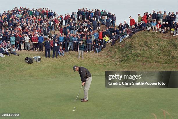 English golfer Justin Rose pictured in action putting on a green during competition to finish in joint 4th place in the 1998 British Open...