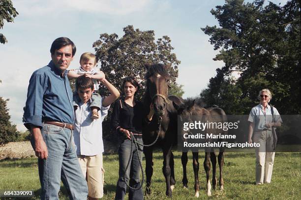 French politician François Fillon with his family, 1st September 2002. Left to right: François Fillon, his sons Edouard and Arnaud , his daughter...