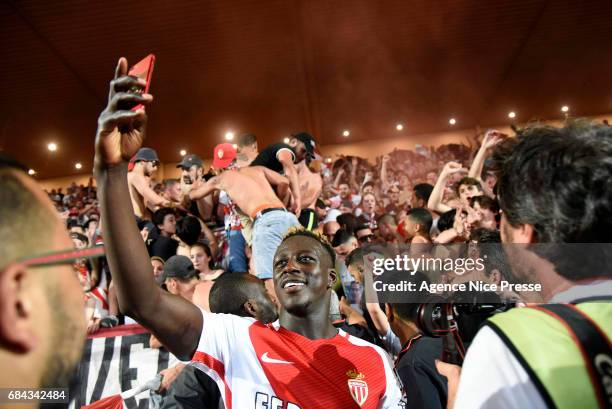 Benjamin Mendy of Monaco celebrate winning the Ligue 1 title after the final whistle of the Ligue 1 match between As Monaco and AS Saint Etienne at...