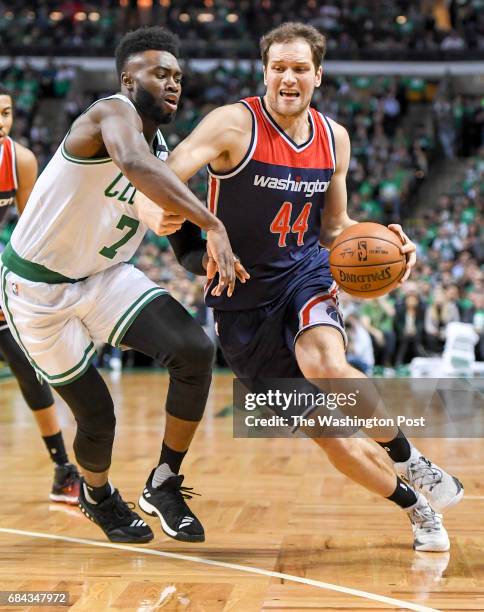 Washington Wizards guard Bojan Bogdanovic drives against Boston Celtics forward Jaylen Brown during game five of the Eastern Conference semifinals in...