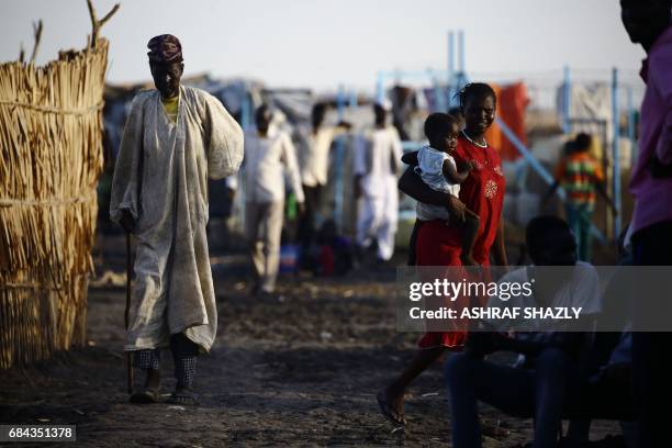 South Sudanese refugees are seen at the UNHCR camp of al-Algaya in Sudan's White Nile state, south of Khartoum, on May 17, 2017. More than 95,000...