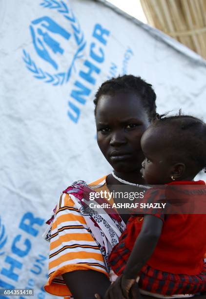 South Sudanese refugees are seen at the UNHCR camp of al-Algaya in Sudan's White Nile state, south of Khartoum, on May 17, 2017. More than 95,000...