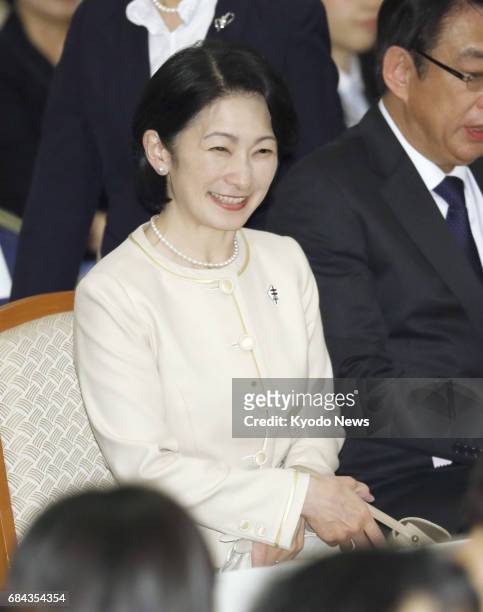 Princess Kiko, mother of Princess Mako who will reportedly soon become engaged to Kei Komuro, a 25-year-old commoner, smiles while attending a...