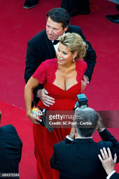 French politician Christian Estrosi and Laura Tenoudji attend the "Ismael's Ghosts " screening and Opening Gala during the 70th annual Cannes Film...