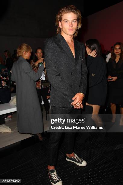 Model Jordan Barrett watches the Strateas.Carlucci show at Mercedes-Benz Fashion Week Resort 18 Collections at Carriageworks on May 18, 2017 in...