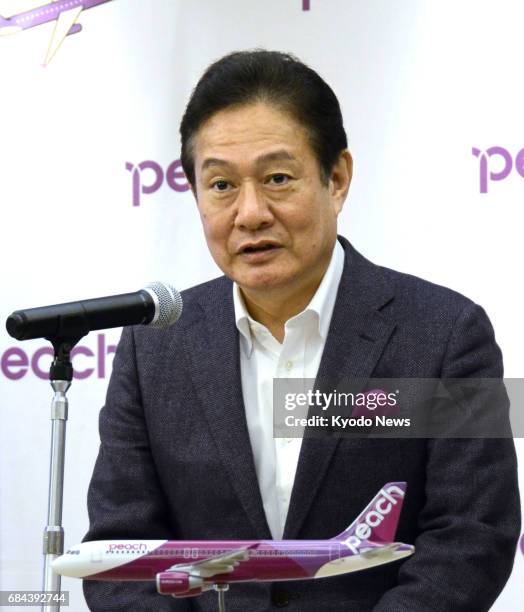 Shinichi Inoue, chief executive officer of Japanese low-cost carrier Peach Aviation Ltd., speaks at a news conference in Sapporo, Hokkaido, on May...