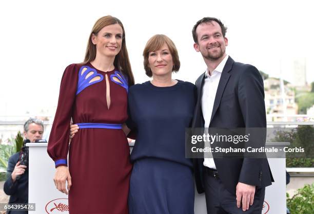 Janine Jackowski, director Valeska Grisebach and Jonas Dornbach attend "Western" Photocall during the 70th annual Cannes Film Festival at Palais des...