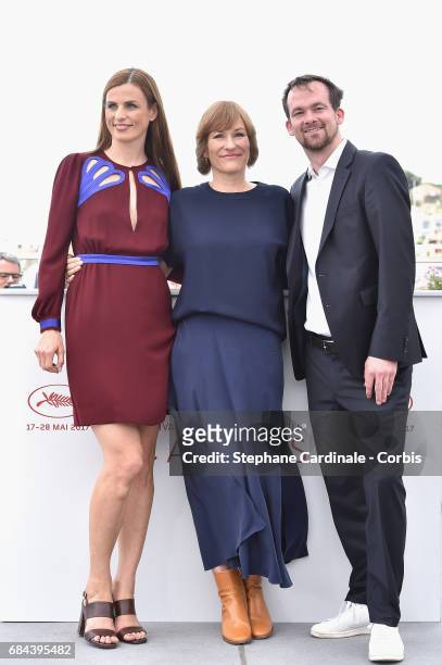 Janine Jackowski, director Valeska Grisebach and Jonas Dornbach attend "Western" Photocall during the 70th annual Cannes Film Festival at Palais des...
