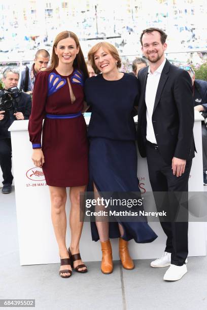 Janine Jackowski, director Valeska Grisebach and Jonas Dornbach attend "Western" Photocall during the 70th annual Cannes Film Festival at Palais des...