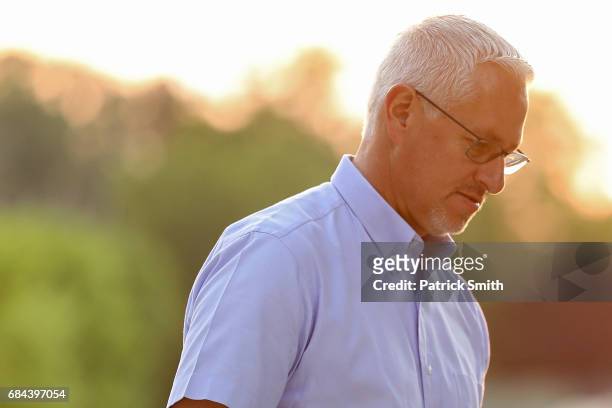 Trainer Todd Pletcher for Kentucky Derby winning horse Always Dreaming walks off of the track following a training session for the upcoming Preakness...