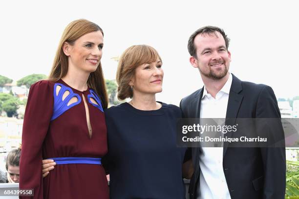 Janine Jackowski, director Valeska Grisebach and Jonas Dornbach attend "Western" Photocall during the 70th annual Cannes Film Festival at Palais des...